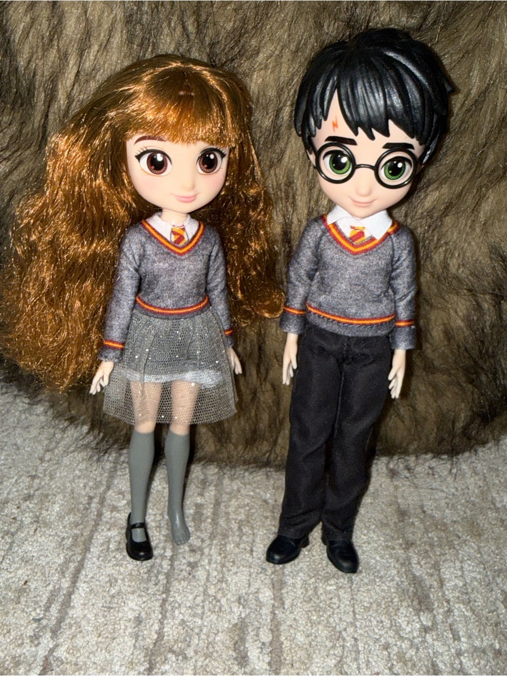 the Wizarding World 8-inch Harry Potter and Hermione Granger Fashion Dolls